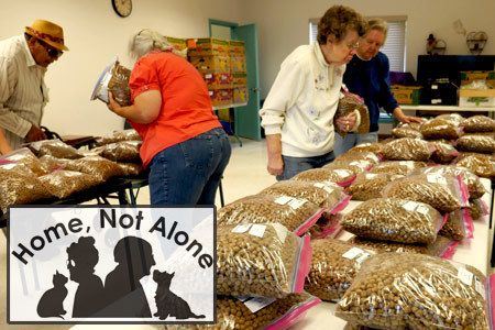 Dog Food Being Distributed to Seniors